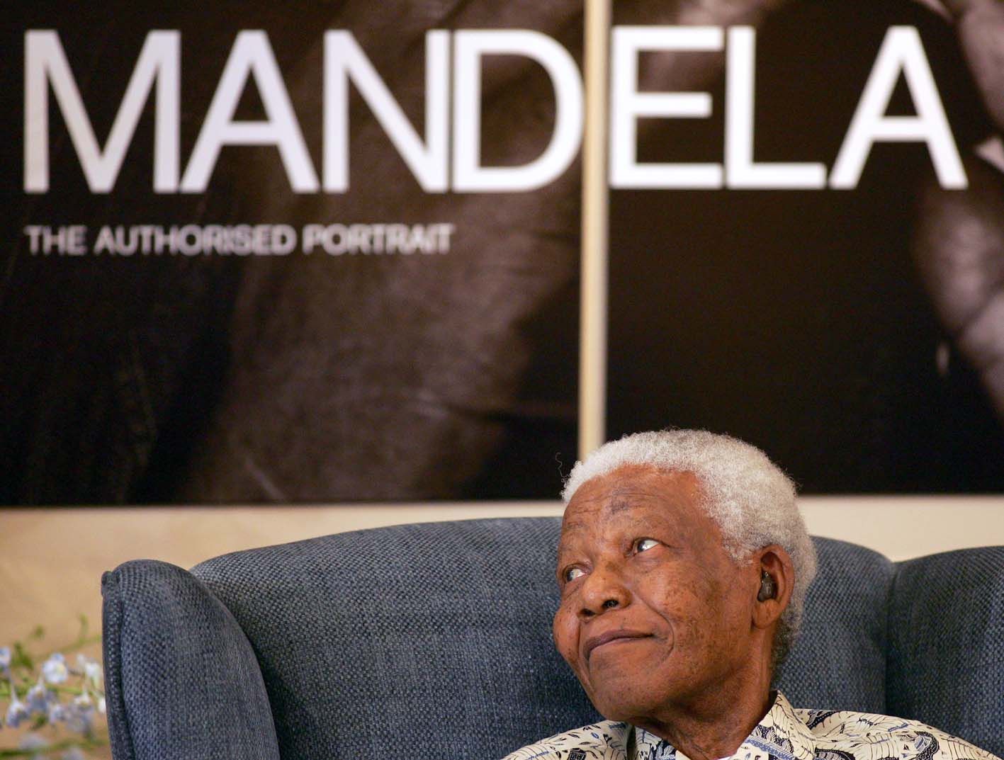 South Africa's former President Nelson Mandela attends the launch of his new book Mandela: The Authorised Portrait on October 9 2006 in Johannesburg. 
