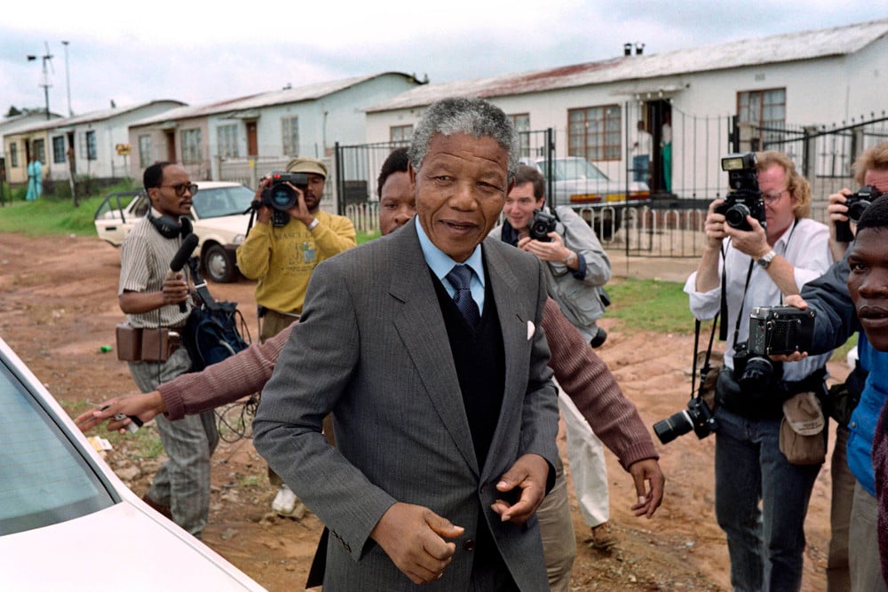 The world's media gathered in Soweto in February 1990 for the return of Nelson Mandela to his Vilakazi Street home. (Philip Littleton, Reuters)
