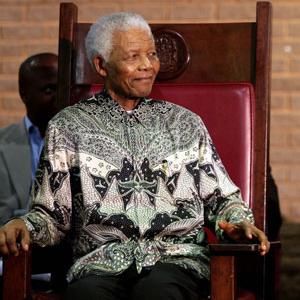 Former president Nelson Mandela celebrates 20 years of freedom on Thursday. (Werner Beukes, Sapa)