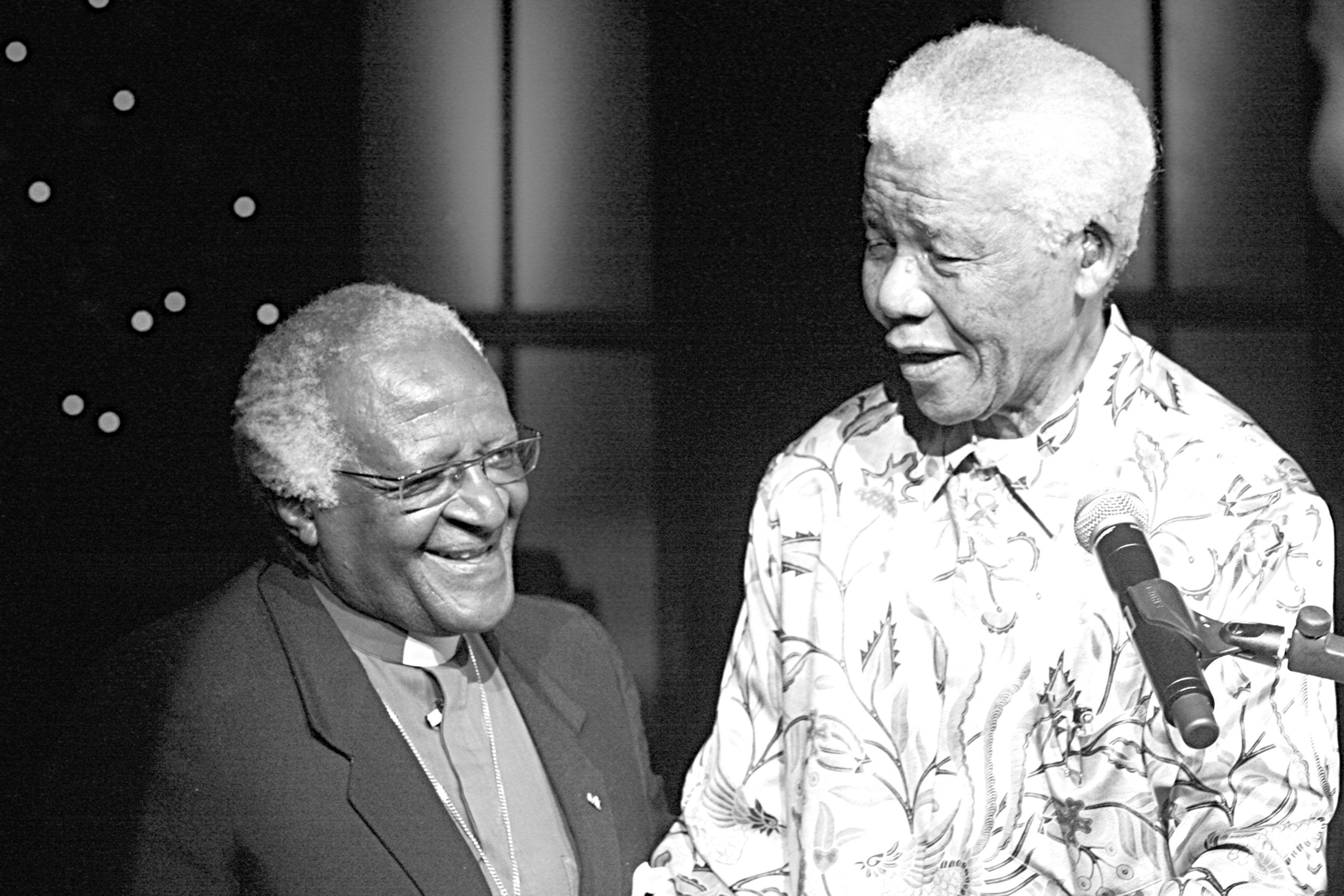 Archbishop Desmond Tutu and Nelson Mandela during Tutu's 75th birthday party in Sandton City on October 8 2006.