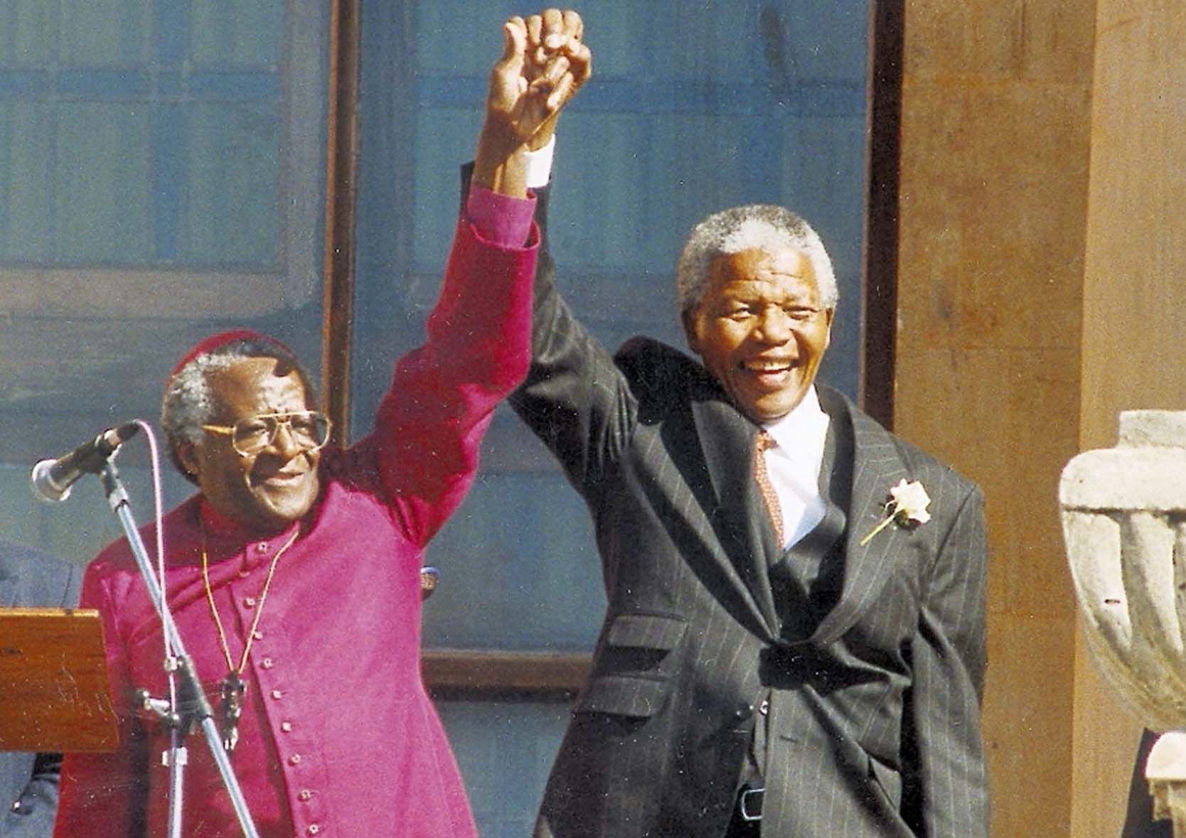 Nelson Mandela with Archbishop Desmond Tutu in 2004.