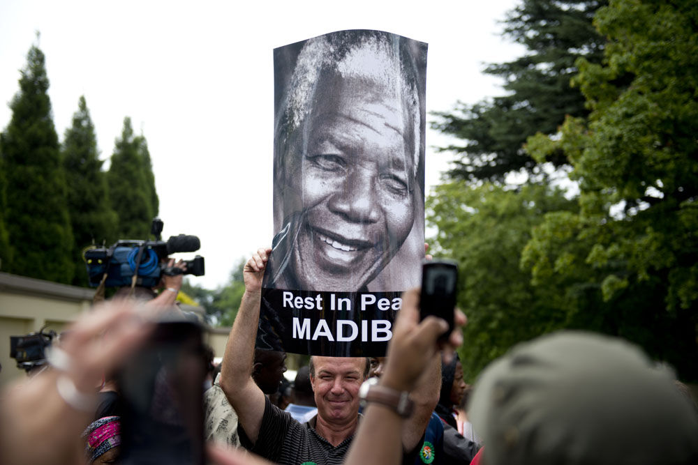 Crowds gather outside Mandela's Houghton home on Friday, Dec 6 2013. (Delwyn Verasamy, M&G)