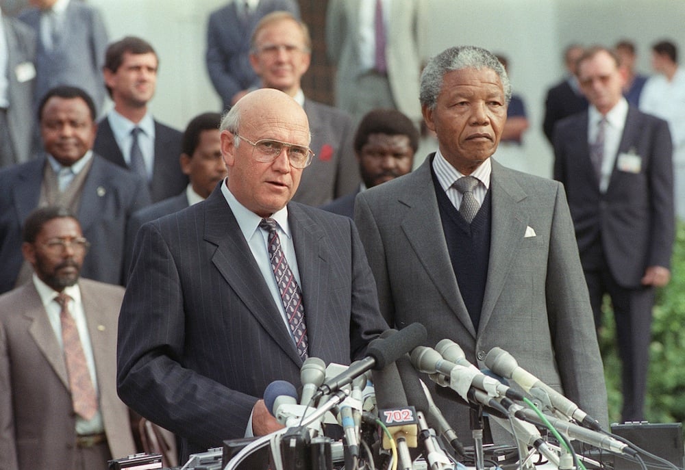 Nelson Mandela is cast all too often as a messiah figure, while his bitter relationship with FW de Klerk (left) is glossed over. (AP)